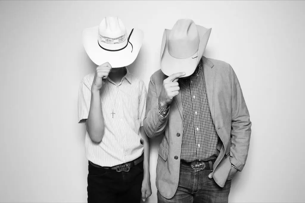 glam photo booth corporate banquet cowboy hats duo