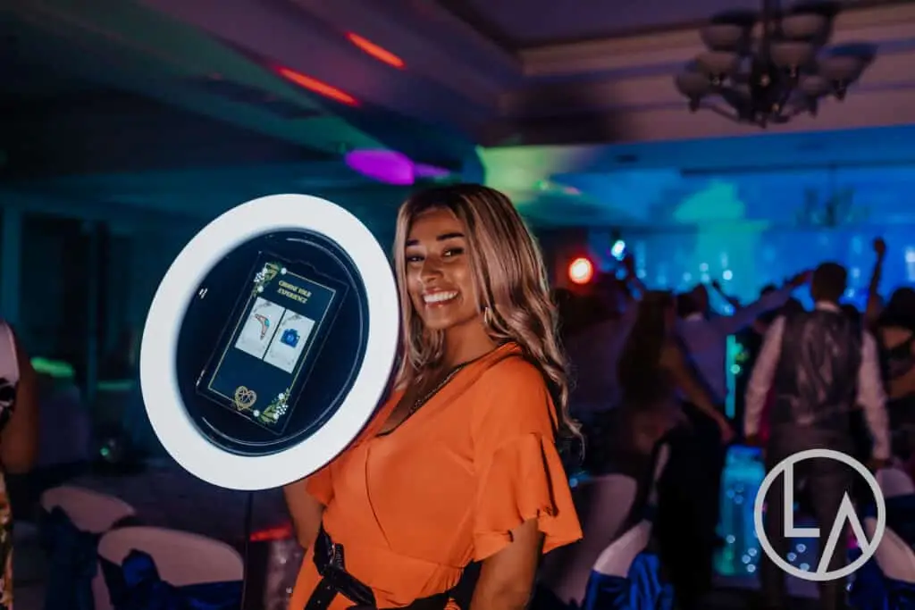 Roaming photo booth ambassador capturing guests at a Kansas City corporate event