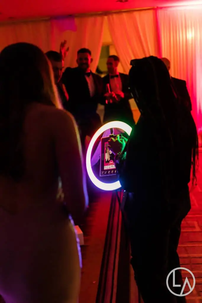 Group of guests posing for the roaming photo booth at a Kansas City event