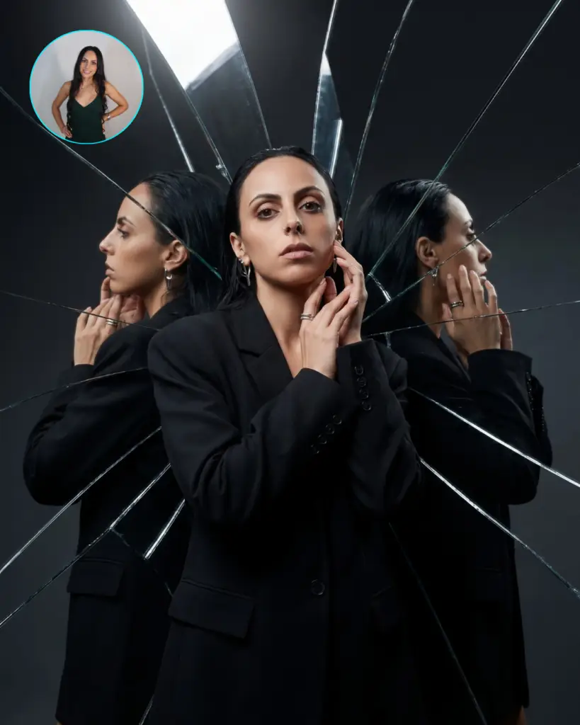 AI-generated portrait of a woman in a black blazer reflected across a shattered mirror effect, created at an AI photo booth experience.