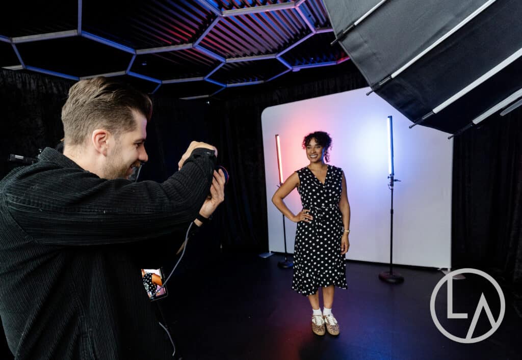 corporate team headshots employer branding kansas city Corporate team member receiving professional headshot at Lumen Activations employer branding event